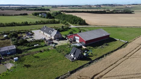 drone image of a farm in the region thisted in the north of denmark, sunny weather