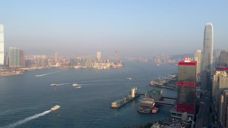 sunset light hong kong city victoria harbour traffic aerial panorama 4k china