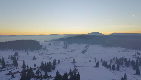 aerial view of the tourist sport, ski area and recreational resort on the mountain jahorina at sunset, bosnia and herzegovina