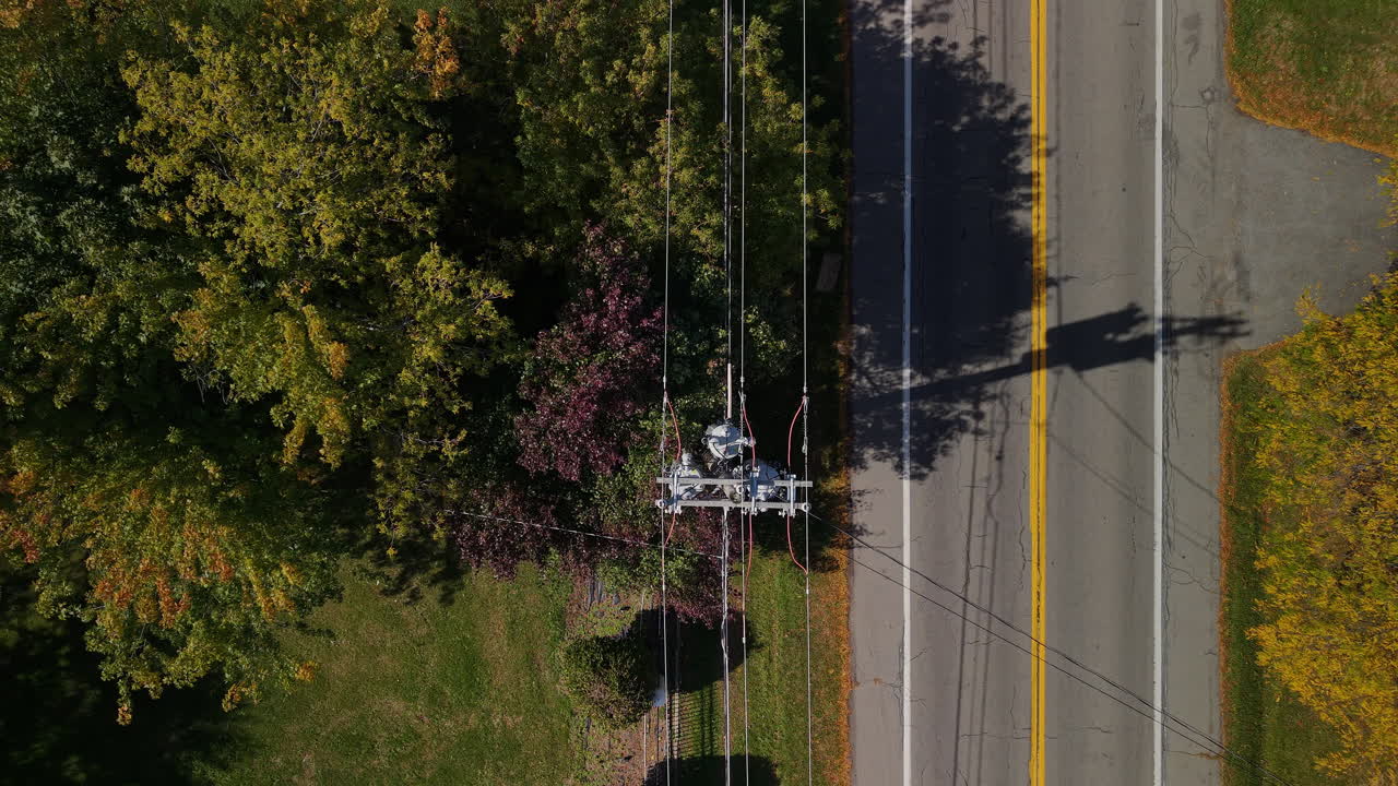 Aerial View of Power Lines and Road