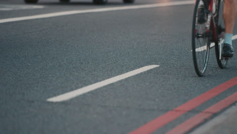 anonymous crowd of people walking cycling bicycles commuters london city street slow motion