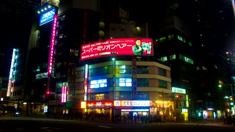 night lapse with japanese neons at south shinjuku wide shot tilt down