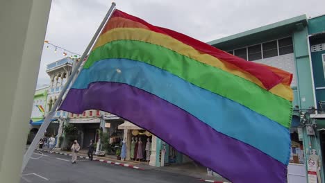 rainbow flag waving in a thai town