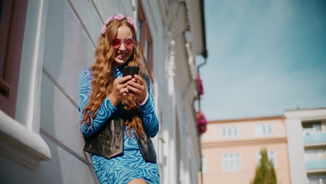 teenage girl on a city street with trendy outfit