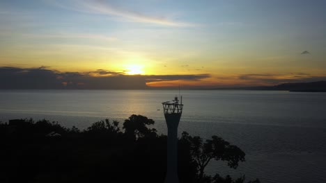 beautiful yellow sunset sky over calm sea view from a solar light tower at limasawa island, southern leyte, philippines