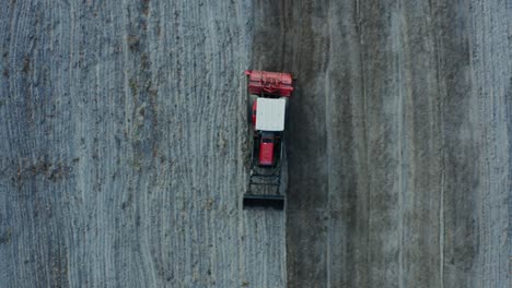 aerial view of tractor working in a field