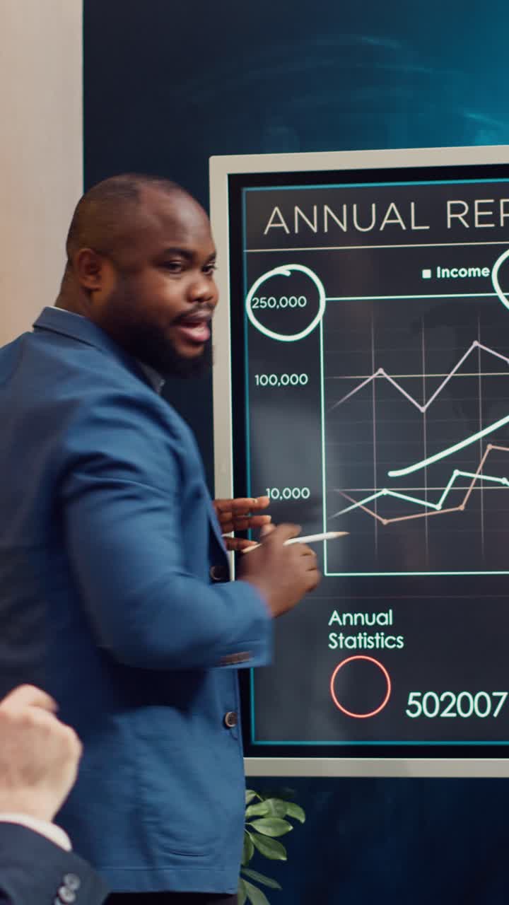 African American Businessman Presenting Annual Report on Digital Screen