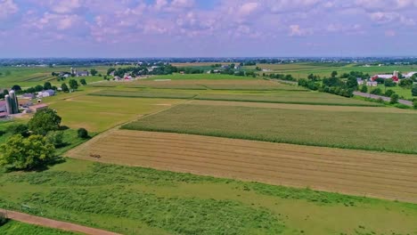 An-Aerial-View-of-Farmlands-and-Countryside-With-a-Mobile,-Manufactured,-Modular-Home-Park-on-a-Beautiful-Summer-Day