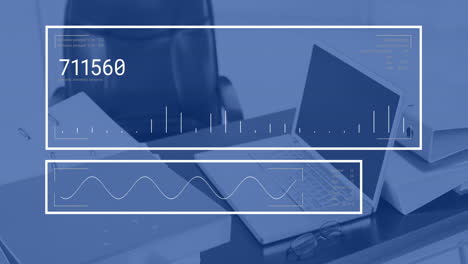 Animation-of-digital-data-processing-over-laptop-on-desk-in-office