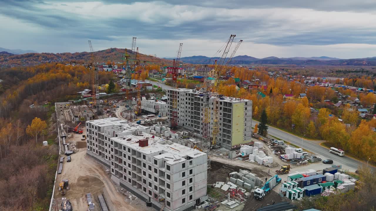 Construction of Apartment Building in Autumnal Landscape