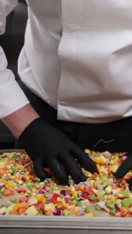 chef preparing a mixed vegetable dish