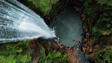 belmore falls, australia, drone descends into falls and pool below