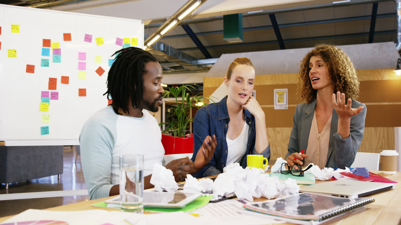 Frustrated colleagues interacting with each other
