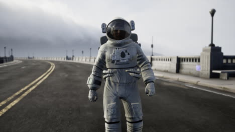 astronaut in space suit on the road bridge