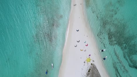 birdseye view of isthmus cayo de agua los roques and people on water sport vacation