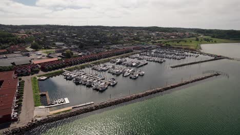 Cinematic-Aerial-Shot-of-Marina,-Sailing-boats,-Yachts-and-Motorboats---Panning-Shot