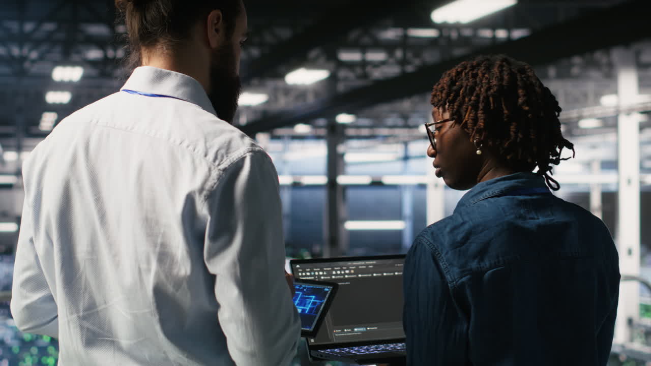 Data center system administrators performing maintenance on AI supercomputers
