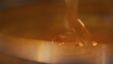 golden thick honey when pouring