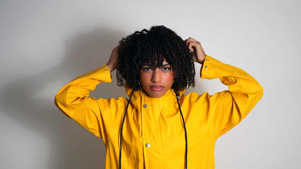 Woman in Yellow Raincoat