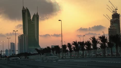 traffic on a highway in bahrain - sunset timelapse - zoom in