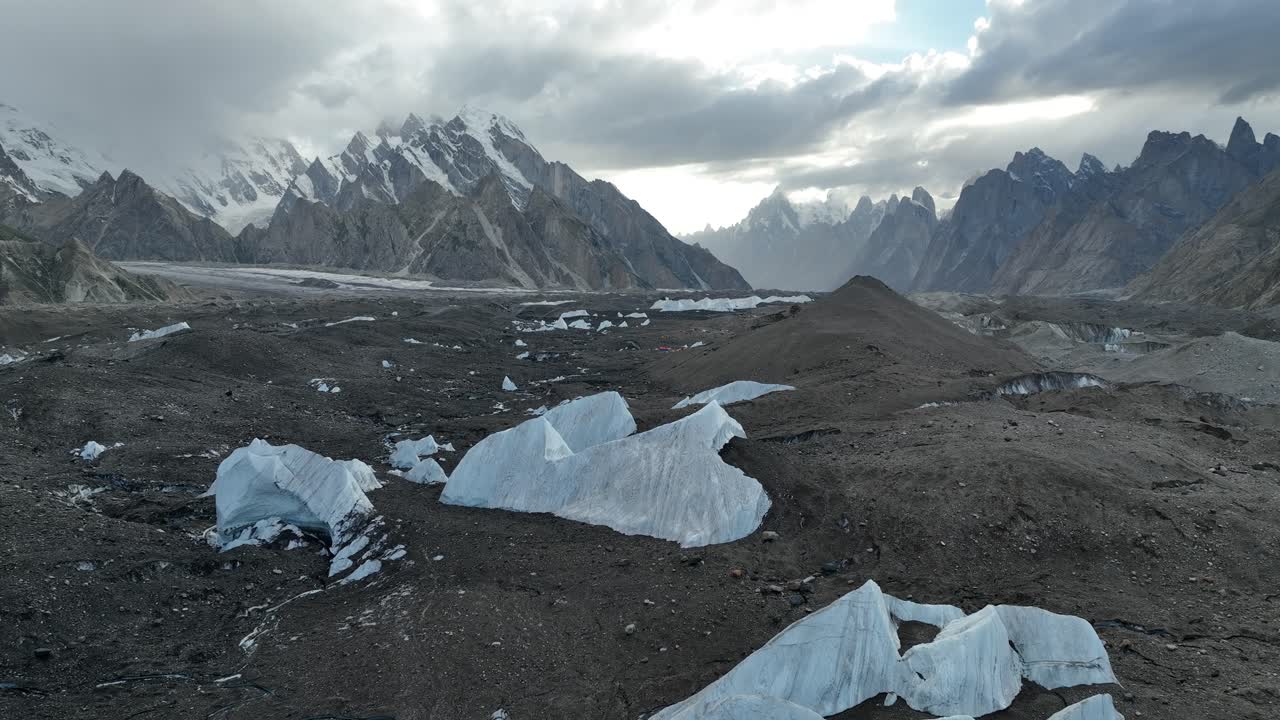 Large pieces of ice lining the Boltoro Glacier on the K2 Base Camp Trek in Pakistan near Goro 2 Campsite.