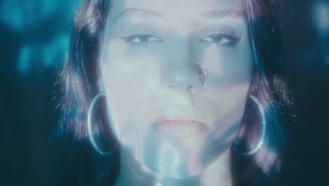 Close-up portrait of a woman with artistic lighting