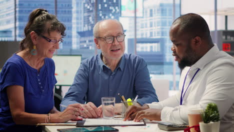 senior citizens consulting a financial planner about retirement planning