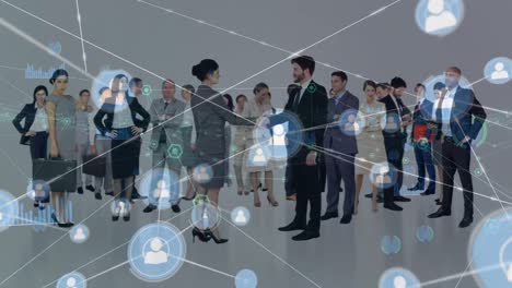 Animation-of-network-of-connections-with-icons-over-diverse-business-people-in-office