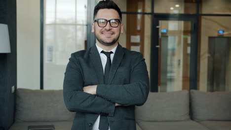 confident businessman in office setting