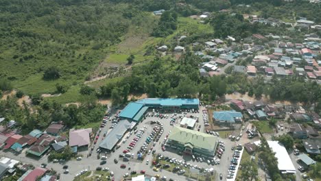 drone view at lundu town during summer, in conjunction of regatta traditional long boat race batang kayan river, with car and bike show.
#regatta