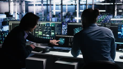 data center system administrators use pc to monitor neural network using ai