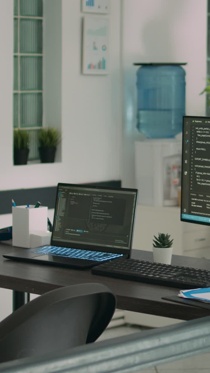Vertical video: African american coder using computer to write code and develop algorithm program