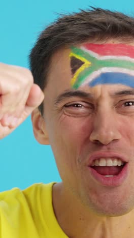 Close up of a man supporting south african team