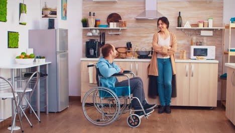 Woman-smiling-at-disabled-husband