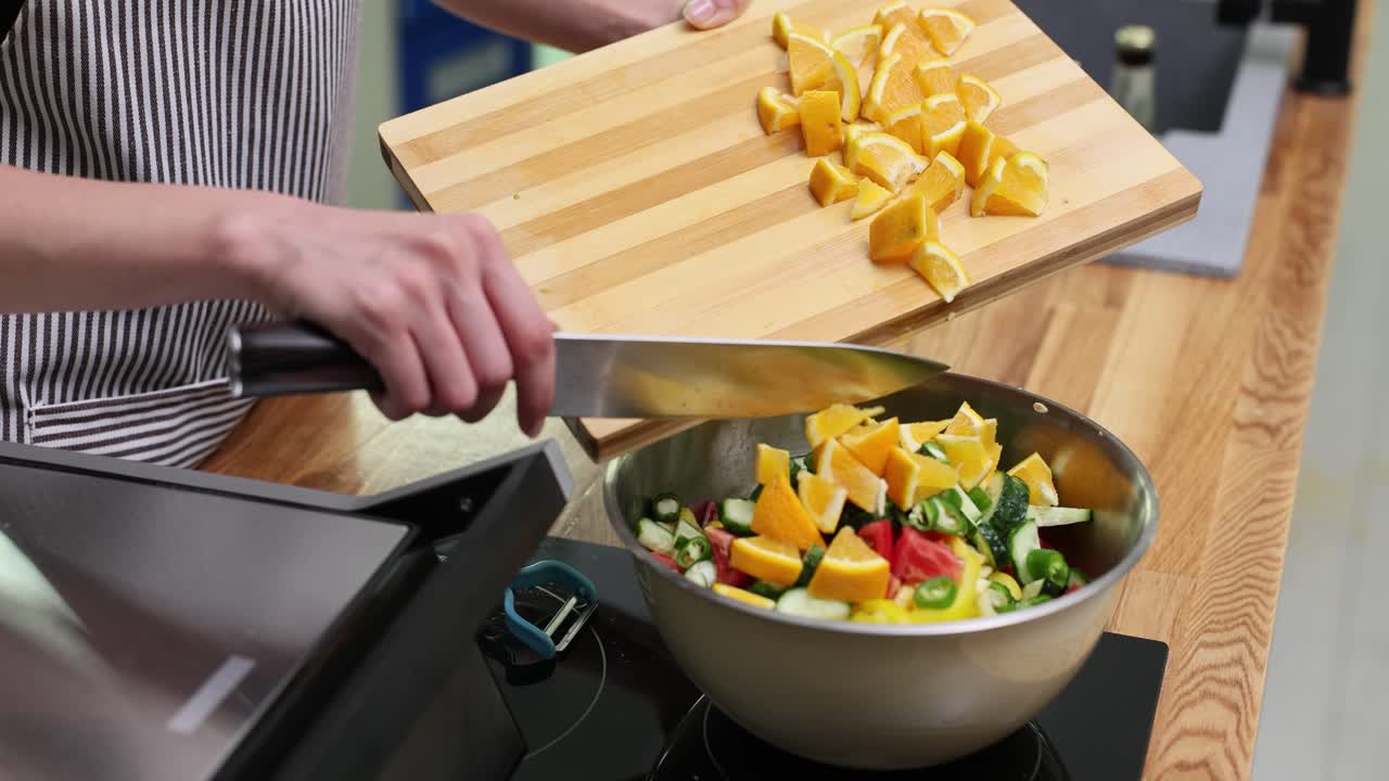 Preparing a Healthy Salad with Orange