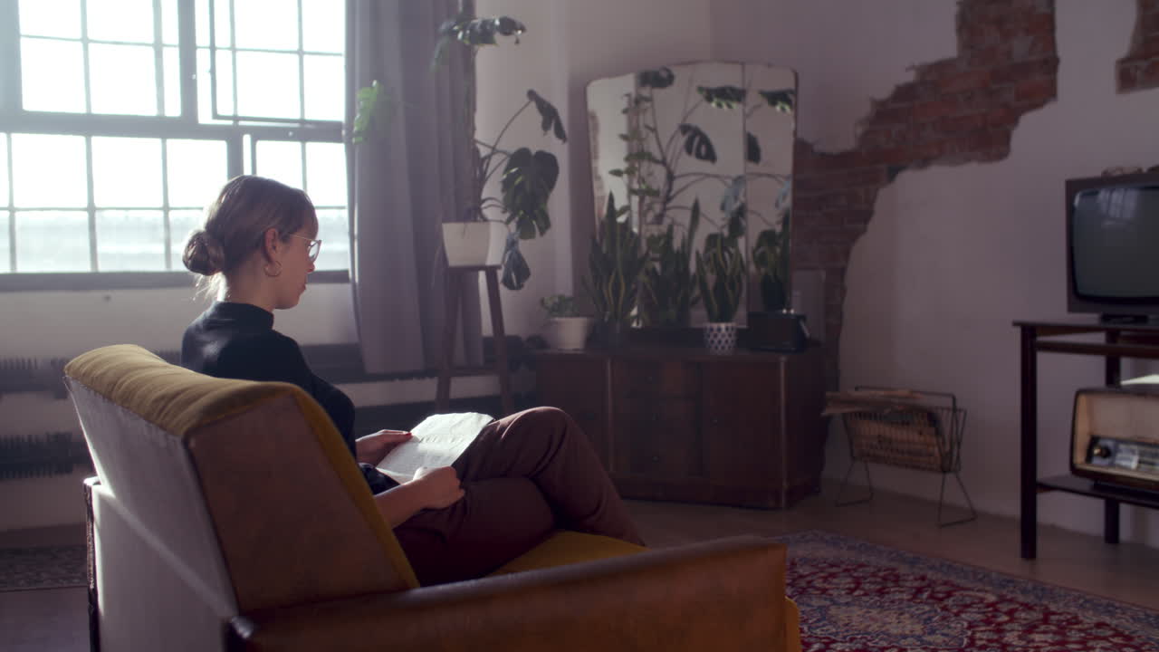 Woman Reading in a Stylish Retro Living Room