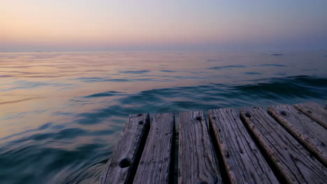 sunrise over a wooden pier