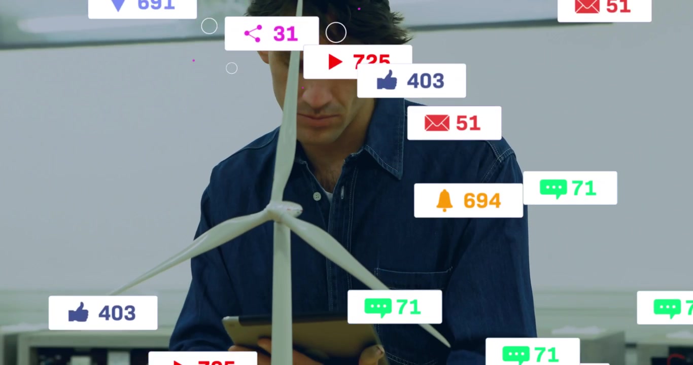 Engineer tapping tablet and testing turbine model in tech lab icons filling frame as blade spinning
