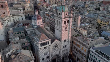 aerial shot of genoa's historic architecture during golden hour, soft light enhancing details