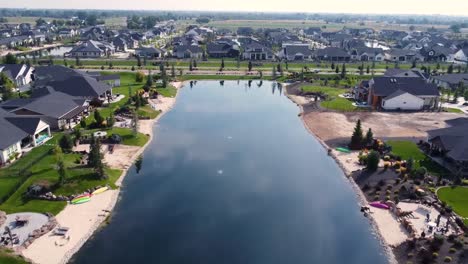 Drone-Flying-Over-A-Pond-In-A-Neighborhood-1080p-120fps