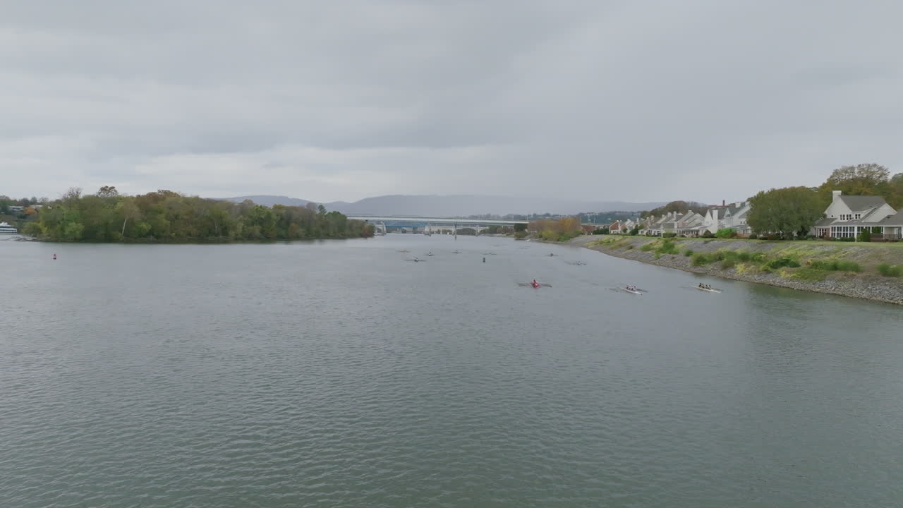 Aerial flyover on the Tennessee River of the Head of the Hooch in Chattanooga flying over rowers in boats
