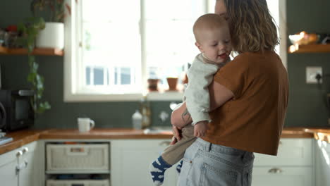 mother and baby in kitchen