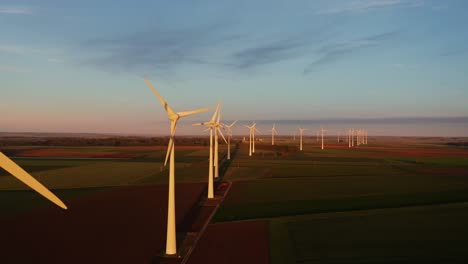 wind farm at sunrise/sunset