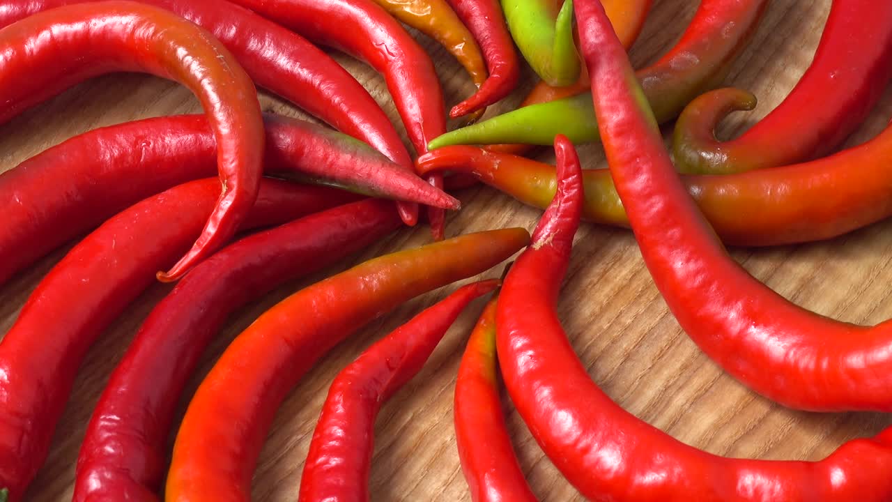 Red chilli, pepper. Shooting in the movement