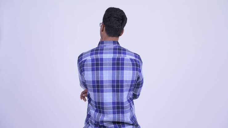 Young handsome Indian hipster man