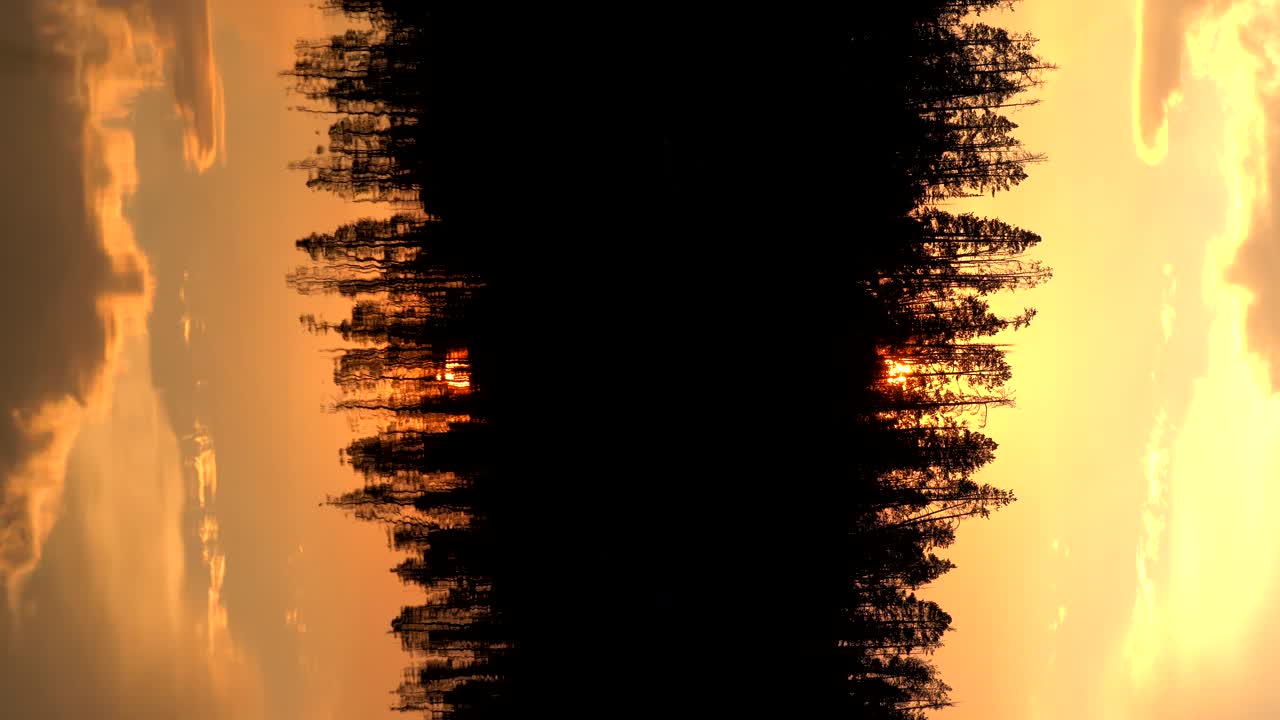 imágenes verticales de la puesta de sol sobre un lago en el parque nacional de yellowstone