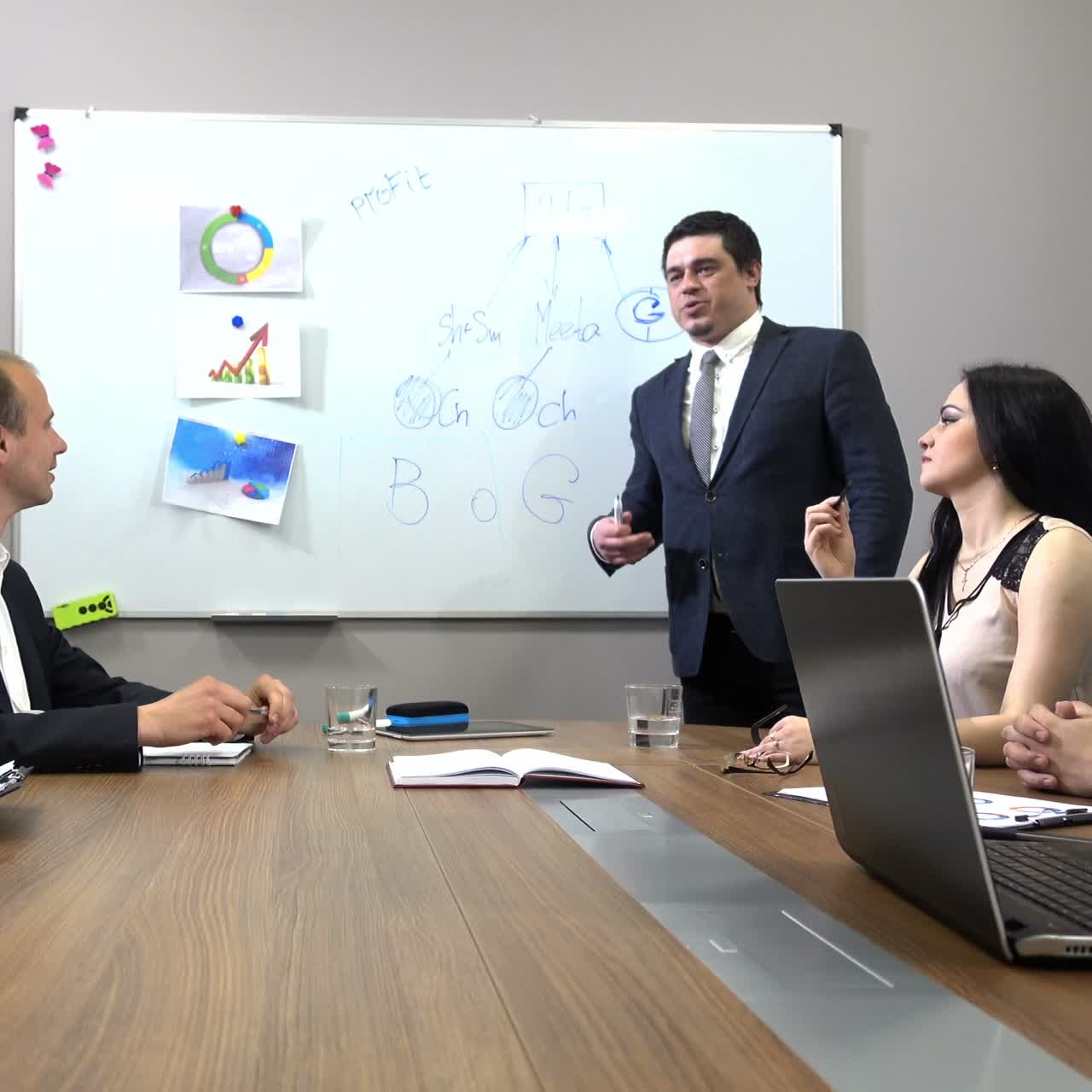 Business People Having Board Meeting