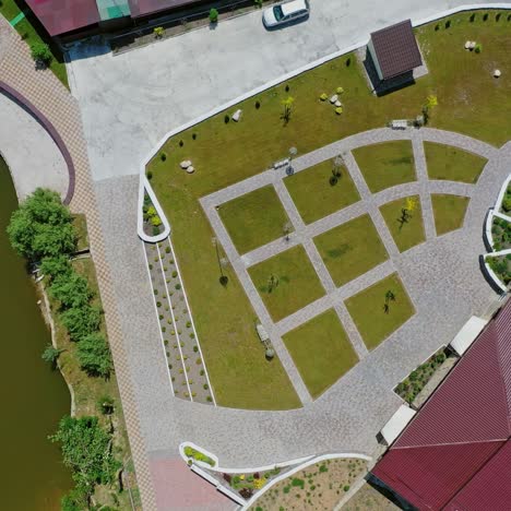 modern recreation complex in summer. new buildings near the river of a relaxing center. motion camera around. aerial view.