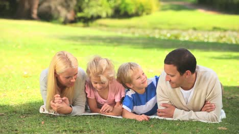 young couple talking with their children