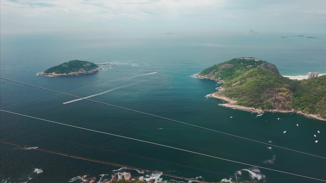 Aerial view over Sugar Loaf islands and Rio de Janeiro coastline with diagonal